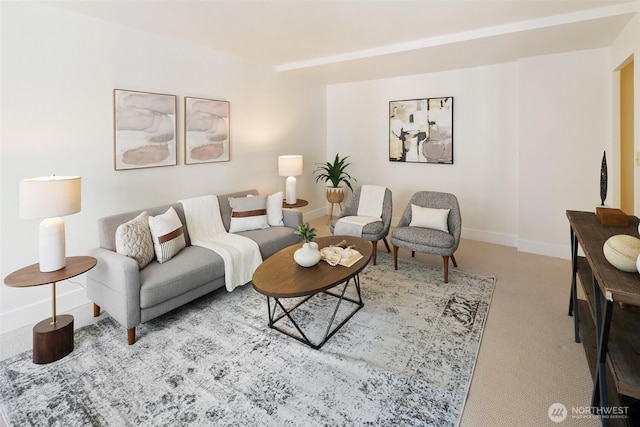 1105 Spring St Unit 712, Seattle, WA 98104 - living area featuring baseboards and carpet floors