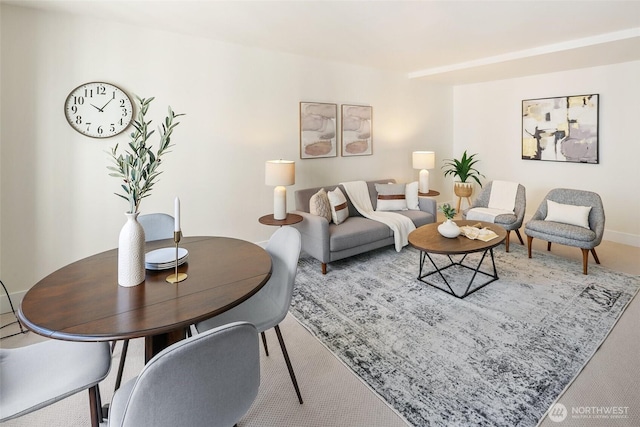 1105 Spring St Unit 712, Seattle, WA 98104 - carpeted living area with baseboards
