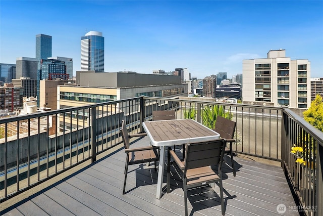 1105 Spring St Unit 712, Seattle, WA 98104 - wooden terrace with a view of skyline