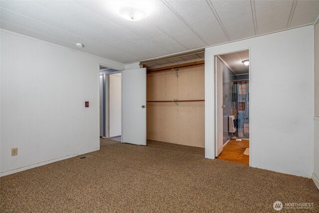 7515 Sunset Dr, Blaine, WA 98230 - unfurnished bedroom with carpet flooring, a closet, and connected bathroom