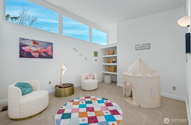 11613 SW Shawnee, Vashon, WA 98070 - rec room featuring carpet floors, built in features, and baseboards