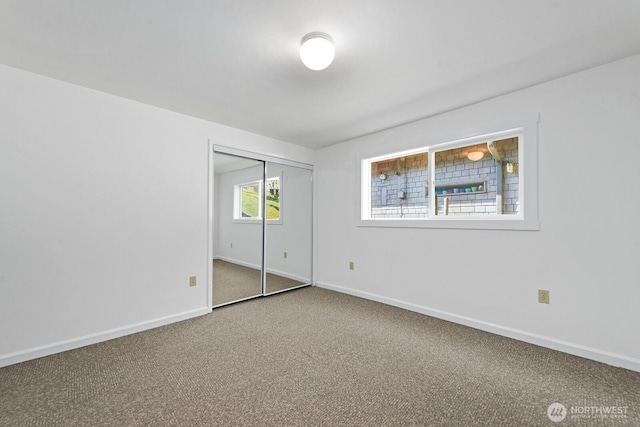 11613 SW Shawnee, Vashon, WA 98070 - unfurnished bedroom with carpet flooring, baseboards, and a closet