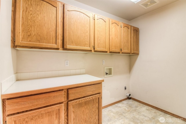 1620 S 68th Ave, Yakima, WA 98908 - laundry area with cabinet space, washer hookup, and electric dryer hookup