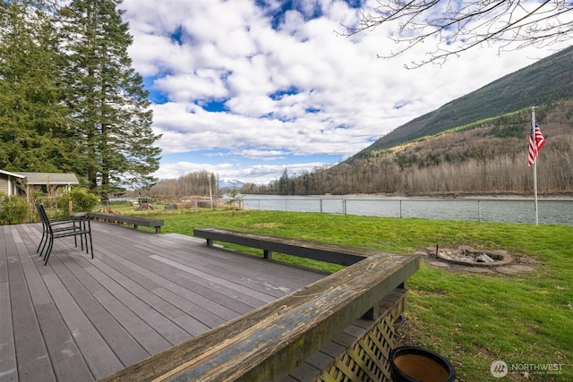 8789 Cedar Ct, Sedro Woolley, WA 98284 - wooden terrace featuring a fire pit and a water and mountain view