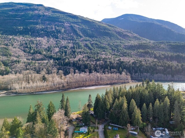8789 Cedar Ct, Sedro Woolley, WA 98284 - drone / aerial view of a heavily wooded area and a water and mountain view