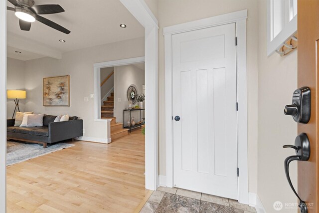 1218 NE 69th St, Seattle, WA 98115 - entrance foyer featuring stairs, baseboards, a ceiling fan, light wood-type flooring, and recessed lighting