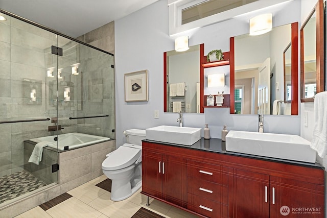 1218 NE 69th St, Seattle, WA 98115 - bathroom with a tile shower, toilet, double vanity, tile patterned floors, and a bath