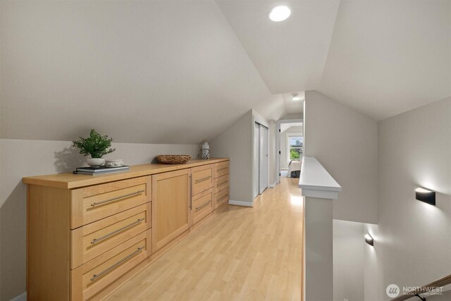 1218 NE 69th St, Seattle, WA 98115 - additional living space featuring light wood-style flooring, lofted ceiling, and baseboards