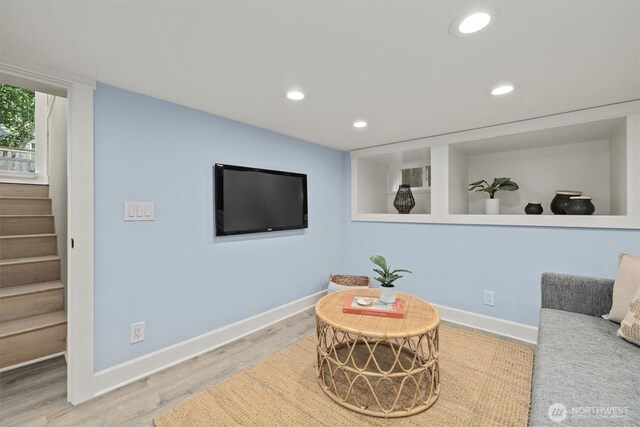 1218 NE 69th St, Seattle, WA 98115 - living area with stairs, wood finished floors, recessed lighting, and baseboards