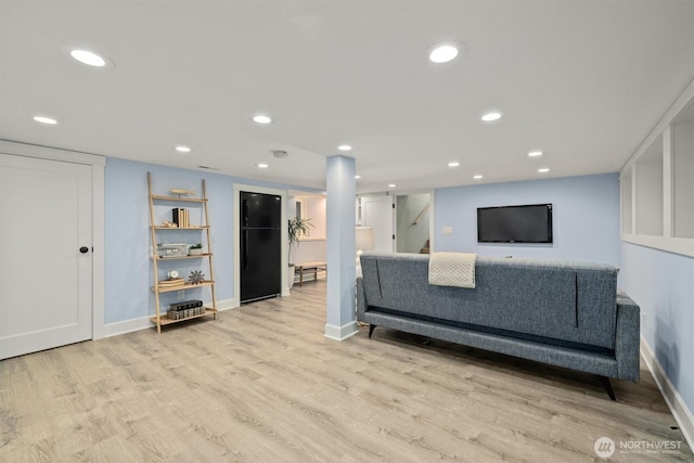 1218 NE 69th St, Seattle, WA 98115 - living area featuring baseboards, light wood-style flooring, recessed lighting, and stairway