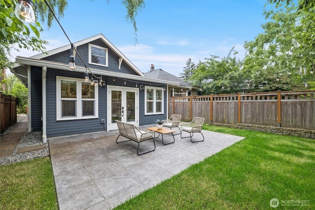 1218 NE 69th St, Seattle, WA 98115 - back of property featuring french doors and a patio