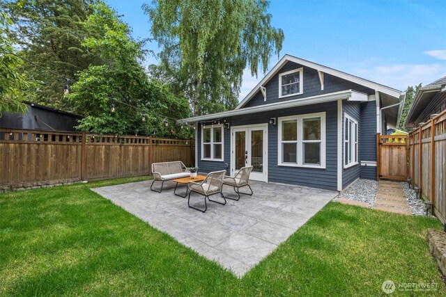 1218 NE 69th St, Seattle, WA 98115 - back of property featuring french doors and a patio area
