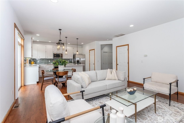 14808 26th Pl W Unit 2, Lynnwood, WA 98087 - living room with light wood-style floors and recessed lighting
