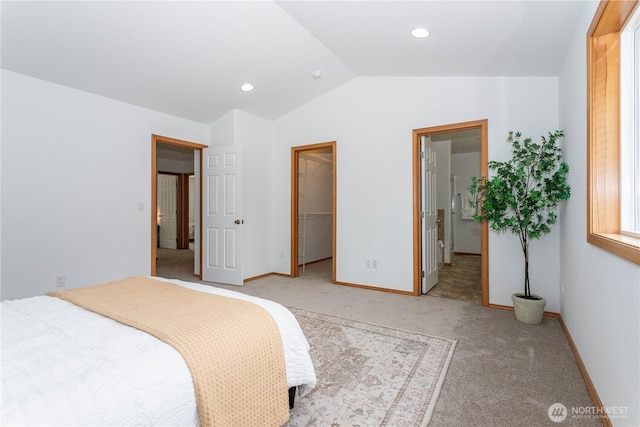 14808 26th Pl W Unit 2, Lynnwood, WA 98087 - bedroom featuring vaulted ceiling, light carpet, a walk in closet, and recessed lighting