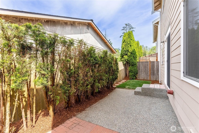 14808 26th Pl W Unit 2, Lynnwood, WA 98087 - fenced backyard featuring a patio