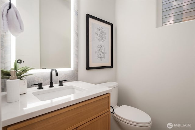 13321 108th Ave NE, Kirkland, WA 98034 - half bathroom featuring tasteful backsplash, toilet, and vanity