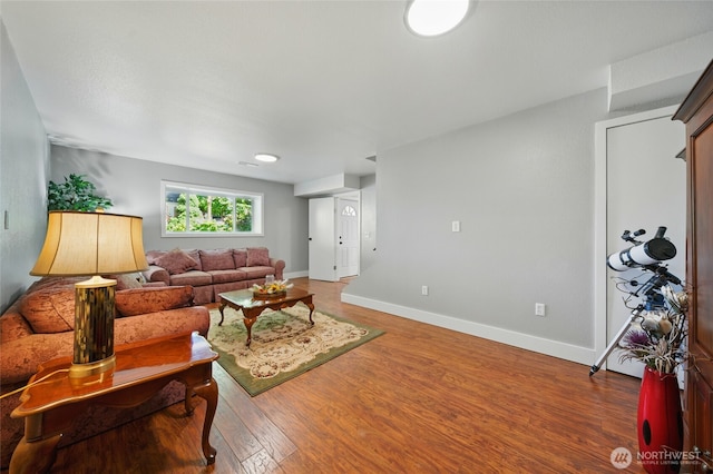 513 SE Highland Park Dr, College Place, WA 99324 - living room with baseboards and wood finished floors