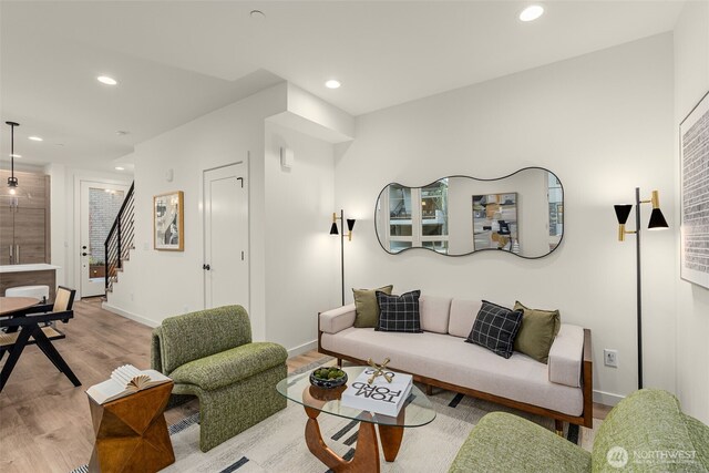 112F 2nd St S, Kirkland, WA 98033 - living room featuring light wood-style flooring, stairway, recessed lighting, and baseboards