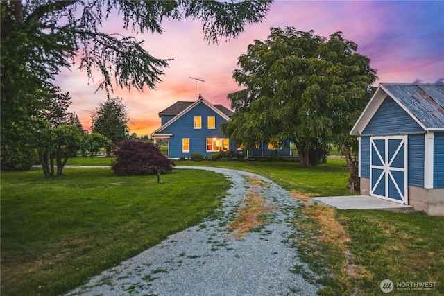 19719 Dry Slough Rd, Mount Vernon, WA 98273 - yard at dusk with a yard, an outdoor structure, and driveway