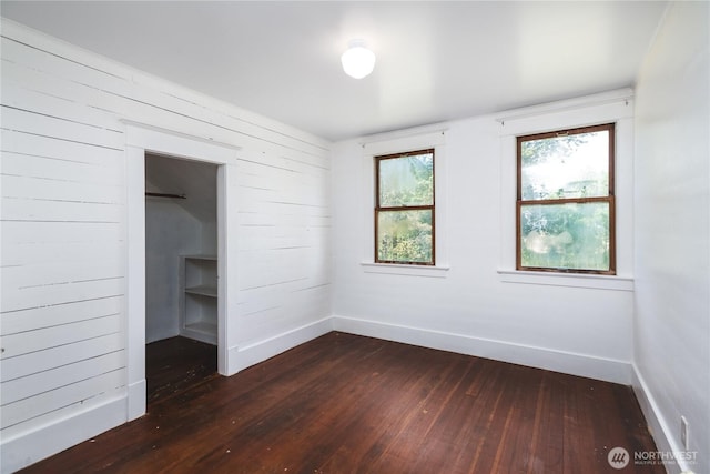 19719 Dry Slough Rd, Mount Vernon, WA 98273 - unfurnished bedroom featuring dark wood finished floors and baseboards
