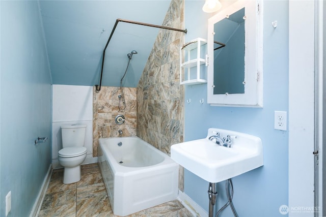 19719 Dry Slough Rd, Mount Vernon, WA 98273 - bathroom featuring toilet, baseboards, and bathing tub / shower combination