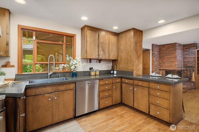 8509 NE 27th Pl, Clyde Hill, WA 98004 - kitchen with stainless steel dishwasher, a peninsula, light wood-type flooring, brown cabinetry, and recessed lighting