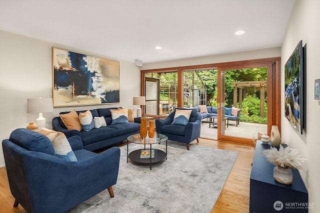 8509 NE 27th Pl, Clyde Hill, WA 98004 - living room featuring wood finished floors and recessed lighting