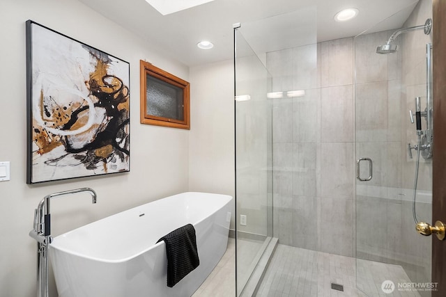 8509 NE 27th Pl, Clyde Hill, WA 98004 - full bathroom featuring a stall shower, a freestanding bath, and recessed lighting