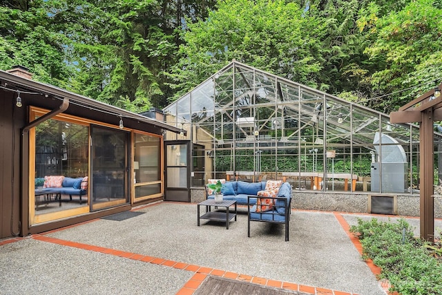 8509 NE 27th Pl, Clyde Hill, WA 98004 - view of patio / terrace with an exterior structure and an outdoor hangout area