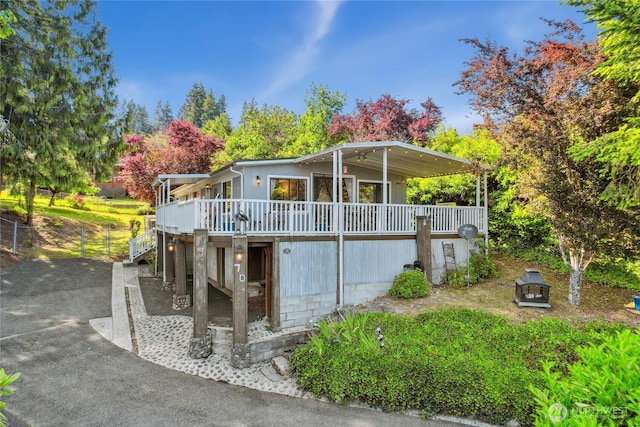 70 E Rustle Way, Grapeview, WA 98546 - view of front facade featuring a deck and stairs