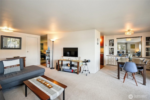 70 E Rustle Way, Grapeview, WA 98546 - living room featuring light carpet