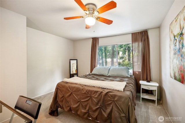 70 E Rustle Way, Grapeview, WA 98546 - carpeted bedroom featuring ceiling fan and baseboards