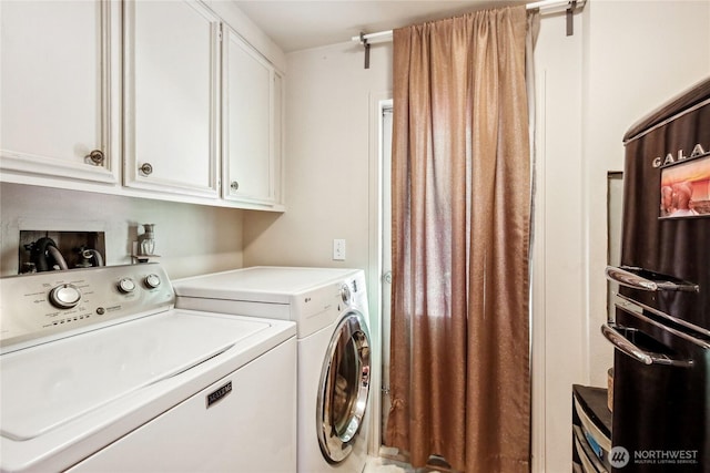 70 E Rustle Way, Grapeview, WA 98546 - washroom featuring washing machine and dryer and cabinet space