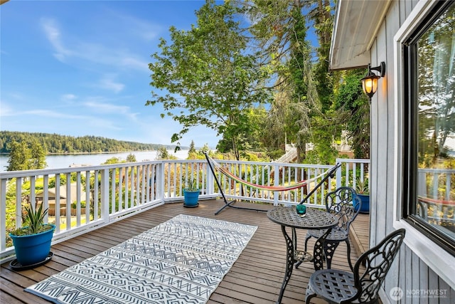 70 E Rustle Way, Grapeview, WA 98546 - wooden deck with a water view