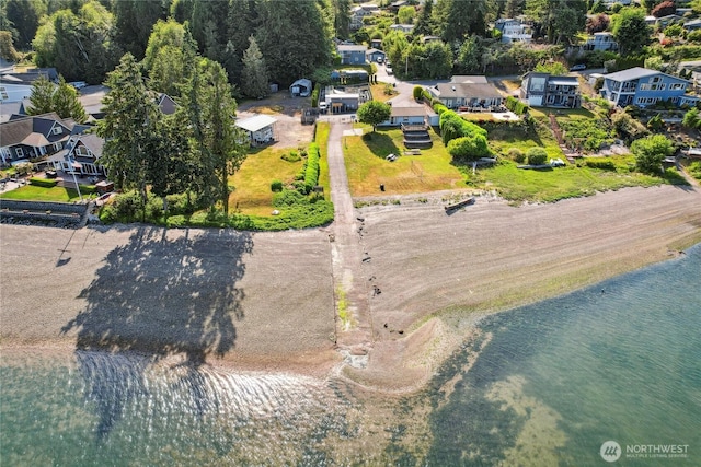70 E Rustle Way, Grapeview, WA 98546 - aerial perspective of suburban area featuring a large body of water