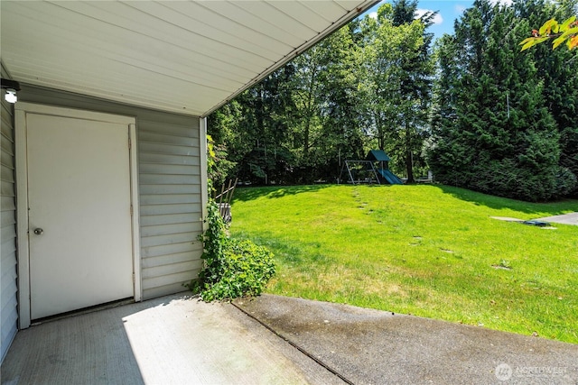7453 Newcastle Golf Club Rd Unit B103, Newcastle, WA 98059 - view of green lawn featuring a patio