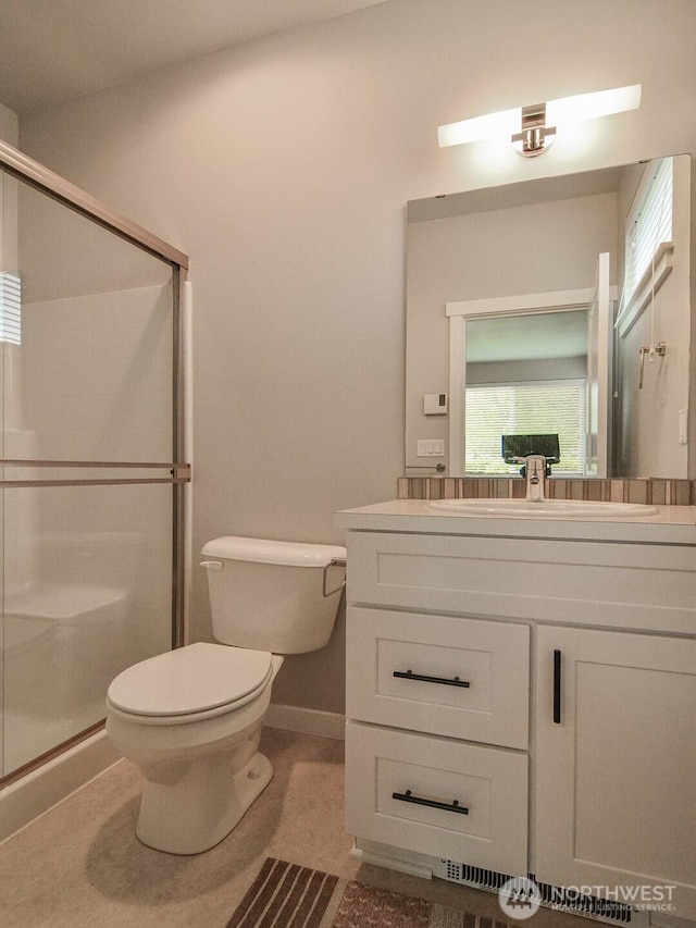 3230 148th St SW Unit C1, Lynnwood, WA 98087 - bathroom with toilet, a shower stall, vanity, and baseboards