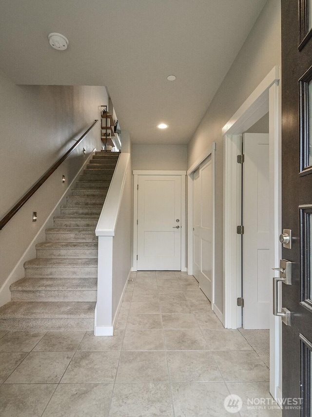 3230 148th St SW Unit C1, Lynnwood, WA 98087 - stairs featuring tile patterned floors, recessed lighting, and baseboards