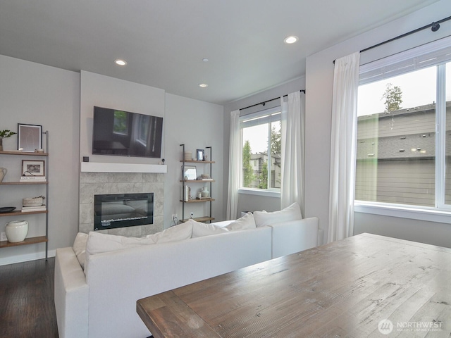 3230 148th St SW Unit C1, Lynnwood, WA 98087 - living room featuring dark wood-type flooring, a tile fireplace, and recessed lighting