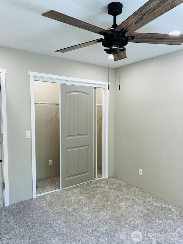 511 Baila Way, Aberdeen, WA 98520 - unfurnished bedroom with carpet, a closet, and a ceiling fan