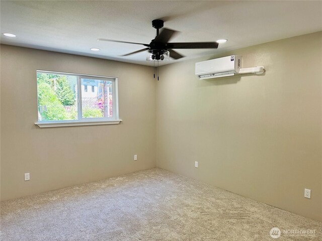511 Baila Way, Aberdeen, WA 98520 - unfurnished room with carpet floors, a wall mounted AC, a ceiling fan, and recessed lighting