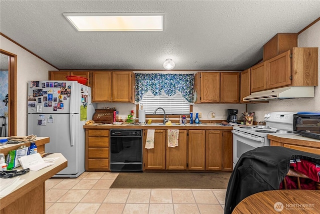 322 N Kentucky Unit A & B, East Wenatchee, WA 98802 - kitchen featuring white appliances, under cabinet range hood, light countertops, a textured ceiling, and light tile patterned floors
