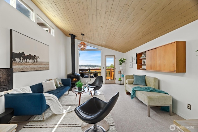 4618 3rd Ave NW, Seattle, WA 98107 - carpeted living area featuring a wood stove, vaulted ceiling, wooden ceiling, and baseboards