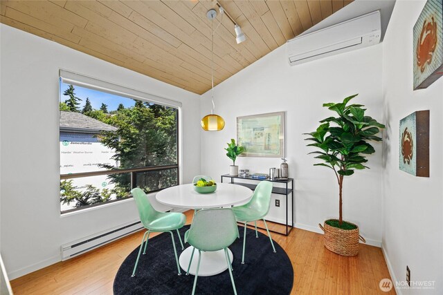 4618 3rd Ave NW, Seattle, WA 98107 - dining room with a baseboard radiator, a wall mounted AC, plenty of natural light, lofted ceiling, and wood ceiling