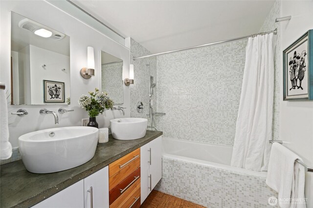 4618 3rd Ave NW, Seattle, WA 98107 - full bathroom featuring tiled shower / bath and double vanity