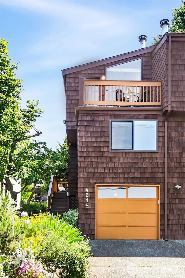 4618 3rd Ave NW, Seattle, WA 98107 - view of front of house featuring an attached garage and a balcony