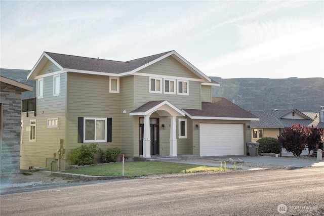 1071 S Section Pl, Quincy, WA 98848 - view of front of home with concrete driveway and a front yard