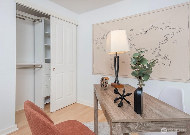301 W Raye St Unit 105, Seattle, WA 98119 - home office with light wood-style floors and baseboards