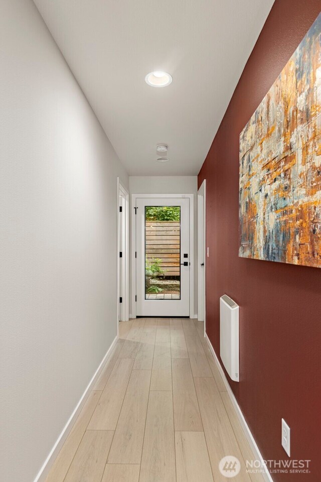 2014 E Pine St Unit A, Seattle, WA 98122 - corridor featuring baseboards and wood finished floors