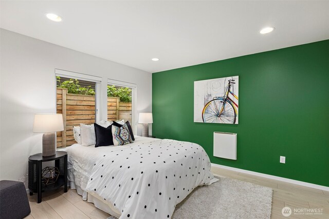 2014 E Pine St Unit A, Seattle, WA 98122 - bedroom with recessed lighting, baseboards, and wood finished floors